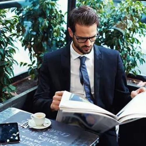 How common are white collar crimes How common are white collar crimes - man in suit reading newspaper