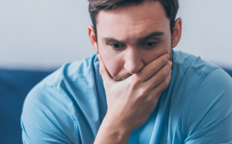 How Much Does a DUI Really Cost? stressed man with hand over mouth