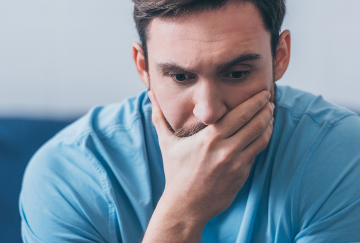 How Much Does a DUI Really Cost? stressed man with hand over mouth