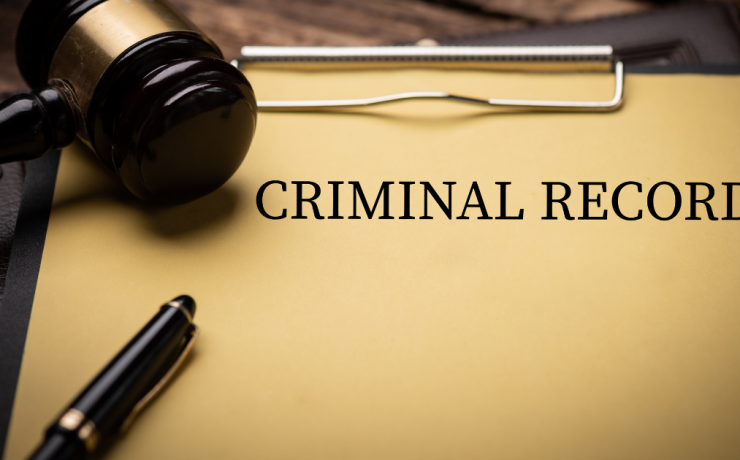 Landmark California Law Takes Effect: Criminal Records Cleared - criminal record file on clipboard with judge's gavel lying on top of it