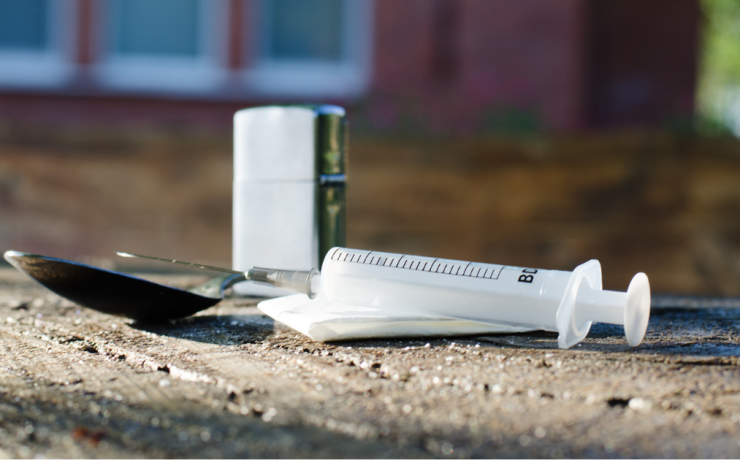 What Are Low-Level Drug Offenders - drug paraphernalia - spoon and syringe