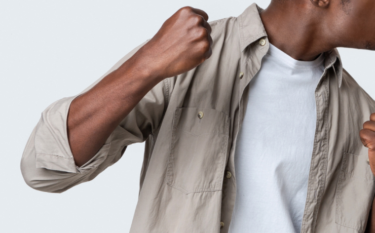 What You Need to Know if You've Been Charged with Assault - man with angry raised fists